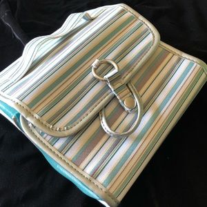 Travel jewelry or cosmetics case.